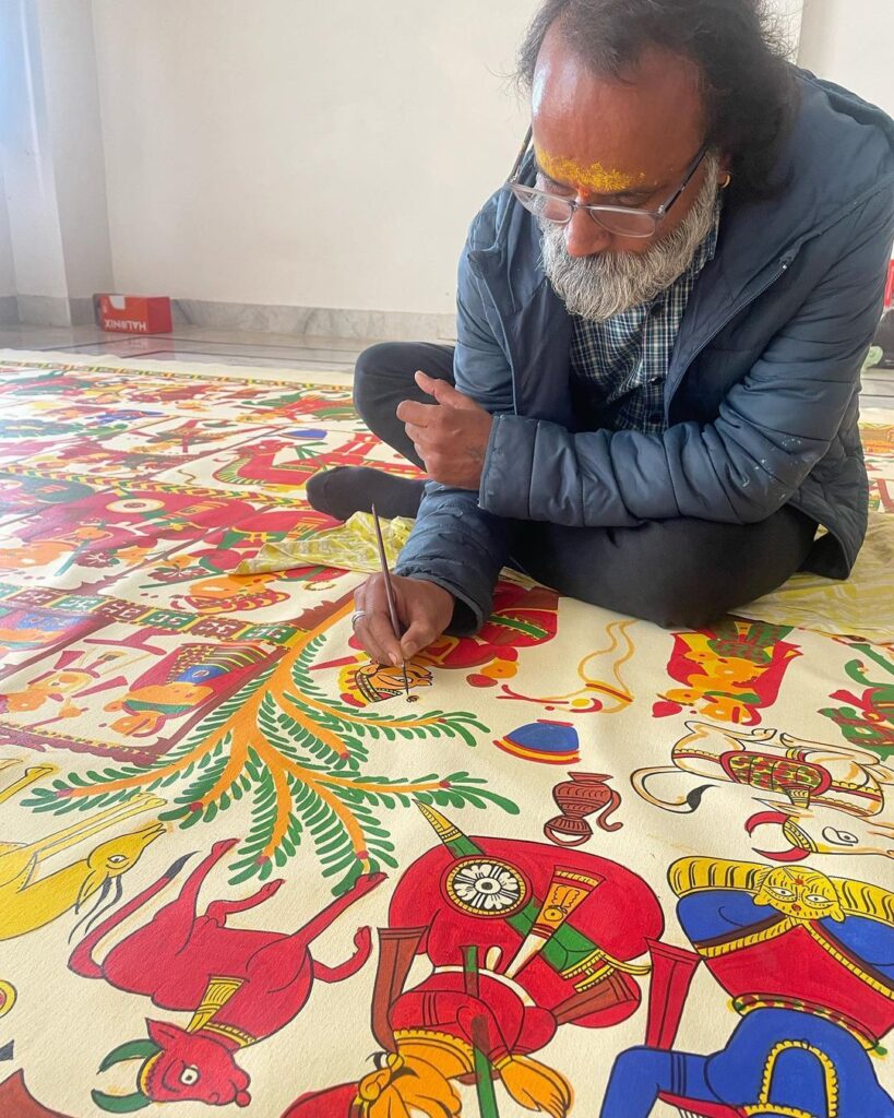 Kalyan Joshi making Phad painting